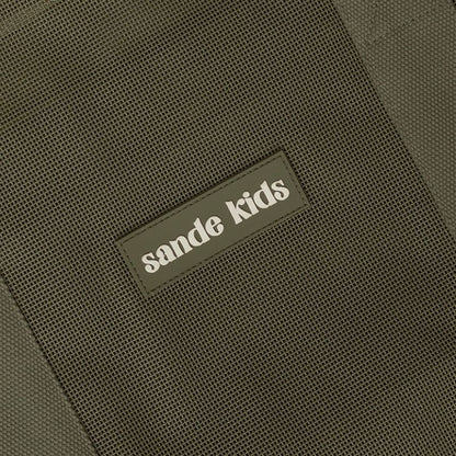 Sande Kids original mesh beach bag with thick cotton straps with silicone Sande Kids label.
