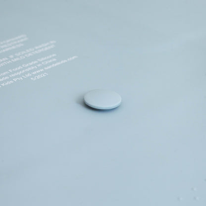 Silicone button detail on the Sande Kids™ Waterproof Pram and Car Seat Liner